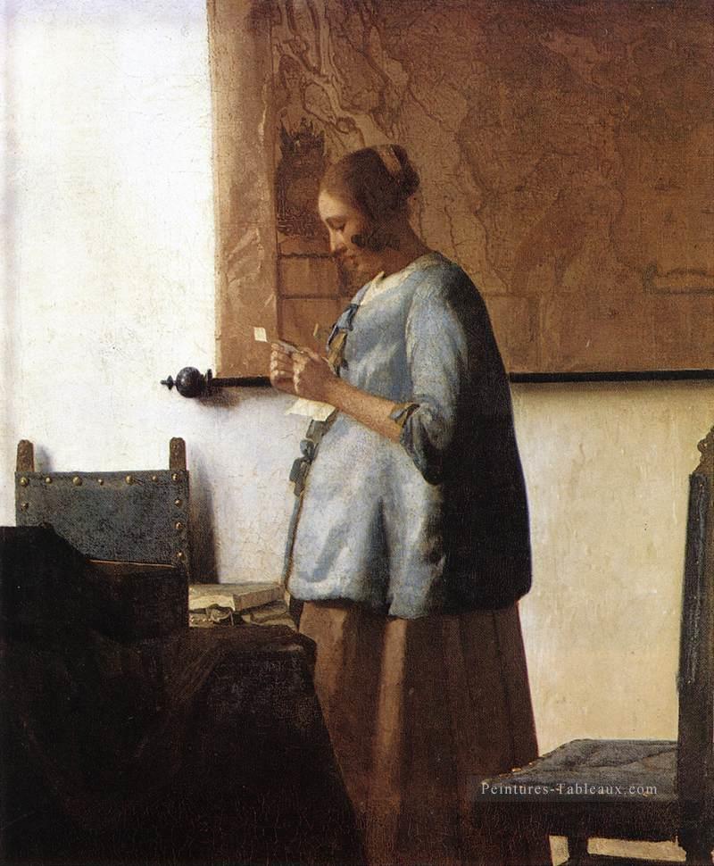 Femme en Bleu Lisant une Lettre Baroque Johannes Vermeer Peintures à l'huile